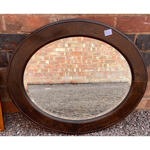 784 - OAK OVAL BEVELLED MIRROR