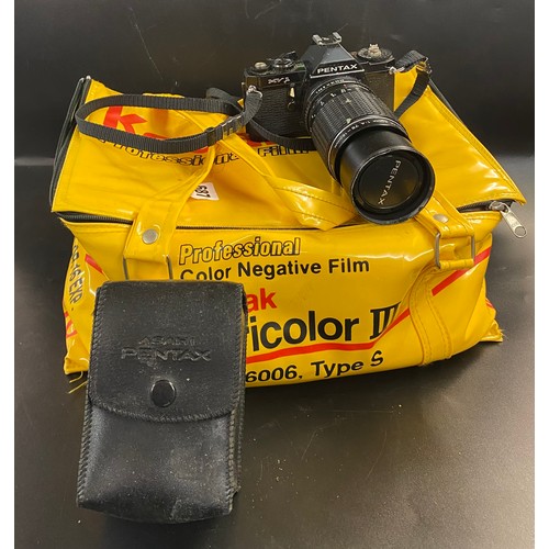 687 - A VINYL KODAK PROFESSIONAL CARRY BAG CONTAINING PANASONIC 500 DIGITAL ZOOM CAMERA, A PENTAX MV1 35MM... 