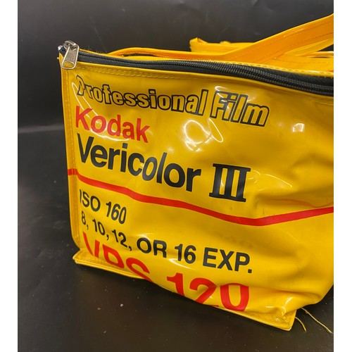 687 - A VINYL KODAK PROFESSIONAL CARRY BAG CONTAINING PANASONIC 500 DIGITAL ZOOM CAMERA, A PENTAX MV1 35MM... 