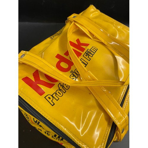 687 - A VINYL KODAK PROFESSIONAL CARRY BAG CONTAINING PANASONIC 500 DIGITAL ZOOM CAMERA, A PENTAX MV1 35MM... 