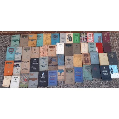 671 - LARGE QUANTITY OF VINTAGE MOTOR CAR INSTRUCTION BOOKS FOR AUSTIN SEVEN, STANDARD EIGHT, RILEYS AND O... 