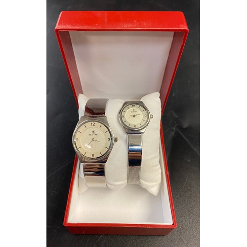 760 - BOXED ROSTINI SLIM STAINLESS STEEL HIS AND HERS WRISTWATCHES WITH MESH BRACELET STRAPS