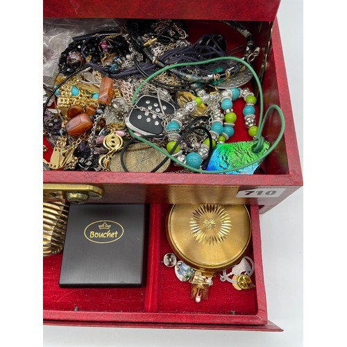 710 - RED JEWELLERY BOX WITH VARIOUS SETS OF EARRINGS, RINGS, PENDANTS AND POWDER COMPACT