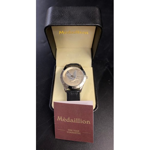 765 - BOXED MEDAILLION WRISTWATCH WITH EAGLE DIAL ON LEATHER STRAP