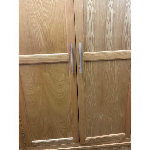 21 - CONTEMPORARY LIGHT OAK TWO DOOR WARDROBE WITH DRAWER BASE