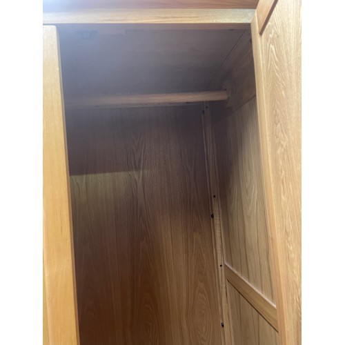 22 - CONTEMPORARY LIGHT OAK TWO DOOR WARDROBE WITH DRAWER BASE