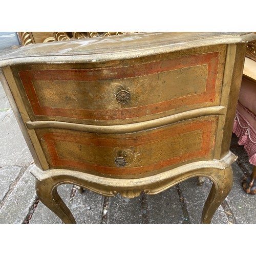 27 - GOLD LAQUERED SERPENTINE ITALIAN CHEST OF TWO DRAWERS