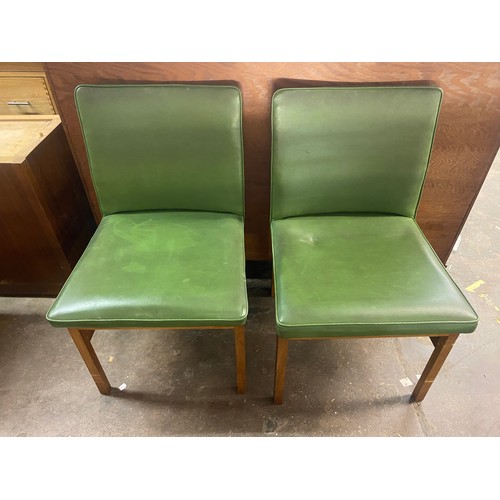 200 - PAIR OF GREEN OFFICE CHAIRS