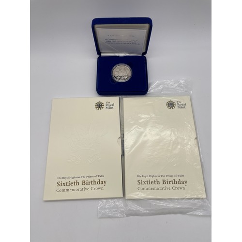 423 - ROYAL MINT HIS ROYAL HIGHNESS THE PRINCE OF WALES 60TH BIRTHDAY COMMEMORATIVE CROWN X 2, AND A ROYAL... 