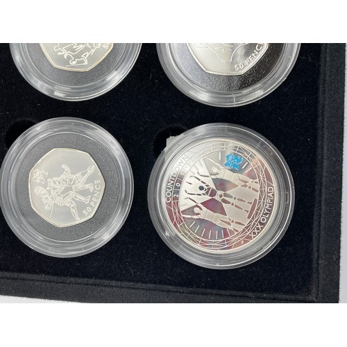 427 - ROYAL MINT LONDON 2012 SILVER 50P SPORTS COIN COLLECTION