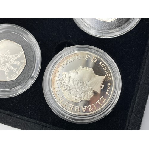 427 - ROYAL MINT LONDON 2012 SILVER 50P SPORTS COIN COLLECTION