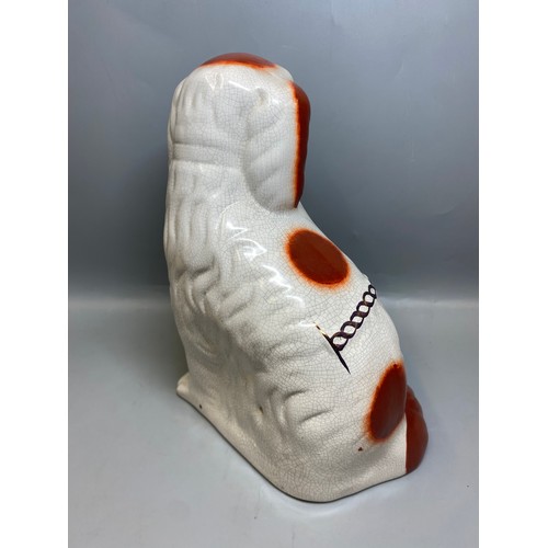 273 - REPRODUCTION PAIR OF STAFFORDSHIRE SEATED SPANIELS
