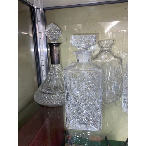 263 - FIVE GLASS CYLINDRICAL DECANTERS WITH STOPPERS, SHIPS DECANTER AND SQUARE SECTION DECANTERS