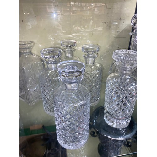 263 - FIVE GLASS CYLINDRICAL DECANTERS WITH STOPPERS, SHIPS DECANTER AND SQUARE SECTION DECANTERS