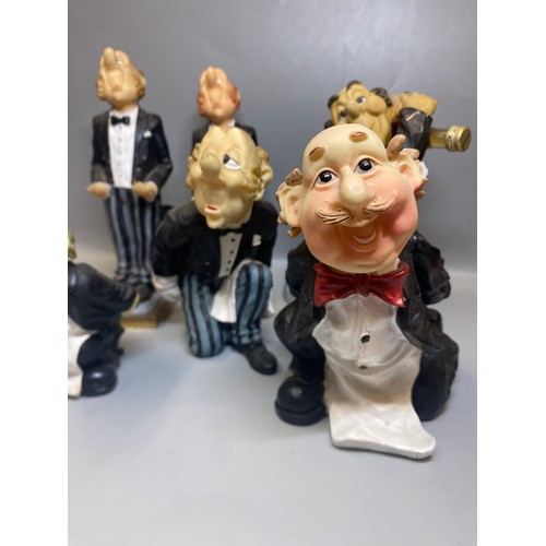 225 - SELECTION OF RESIN NOVELTY WAITER FIGURES AND BOTTLE HOLDERS