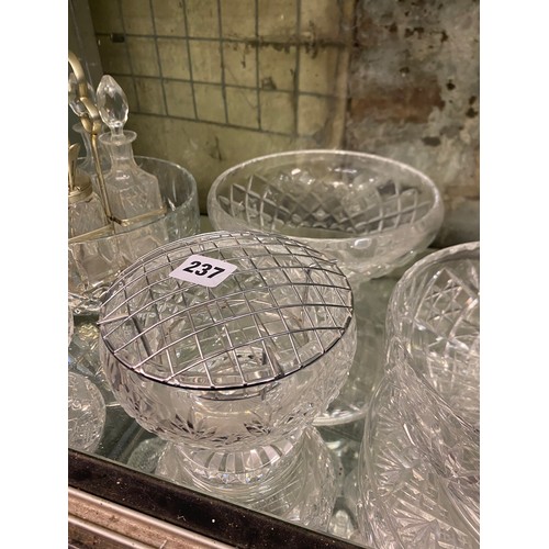 237 - BOTTOM SHELF OF CUT GLASS ROSE BOWLS, ETCHED FRUIT BOWLS, FOUR PIECE CRUET SET
