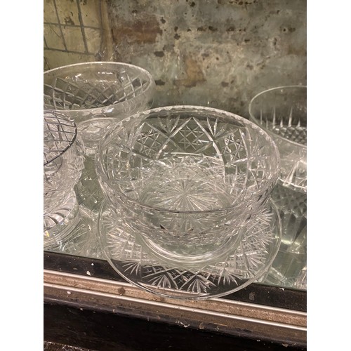237 - BOTTOM SHELF OF CUT GLASS ROSE BOWLS, ETCHED FRUIT BOWLS, FOUR PIECE CRUET SET