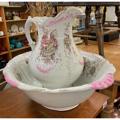 184 - STAFFORDSHIRE PINK FLORAL AND GILDED WASH BASIN JUG AND DISH