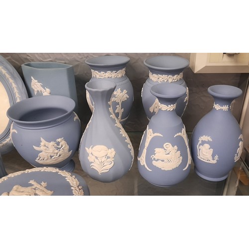 213 - WEDGWOOD BLUE JASPER WARE VASES, TRINKET BOXES, DECORATIVE BELLS, PHOTOGRAPH FRAME