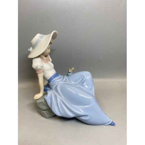 227 - FOUR BOXED LLADRO FIGURES CHILDREN WITH CHAMBER STICKS, PLUS NAO SEATED GIRL FIGURE