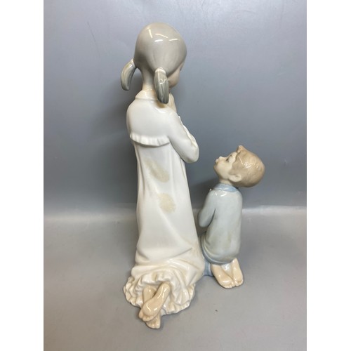 228 - FOUR LLADRO FIGURES OF BEDTIME CHILDREN AND A TRIO OF GEESE
