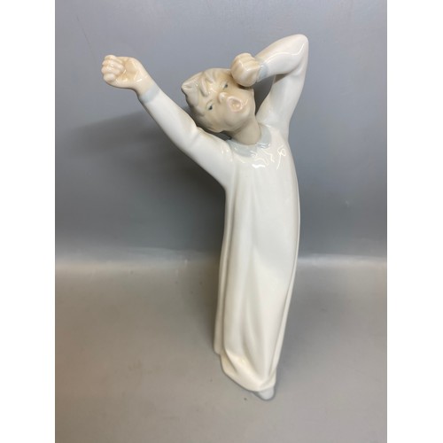 228 - FOUR LLADRO FIGURES OF BEDTIME CHILDREN AND A TRIO OF GEESE