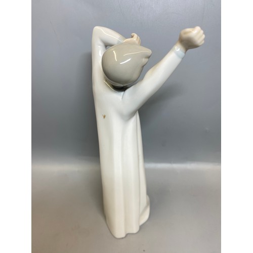 228 - FOUR LLADRO FIGURES OF BEDTIME CHILDREN AND A TRIO OF GEESE