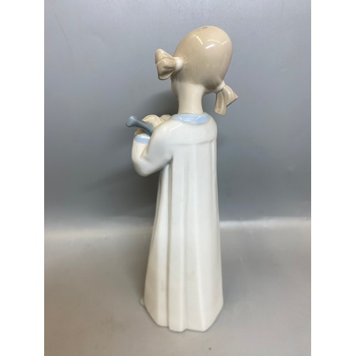 228 - FOUR LLADRO FIGURES OF BEDTIME CHILDREN AND A TRIO OF GEESE
