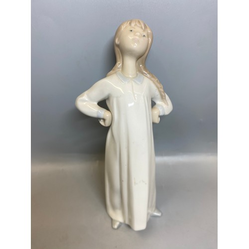 228 - FOUR LLADRO FIGURES OF BEDTIME CHILDREN AND A TRIO OF GEESE