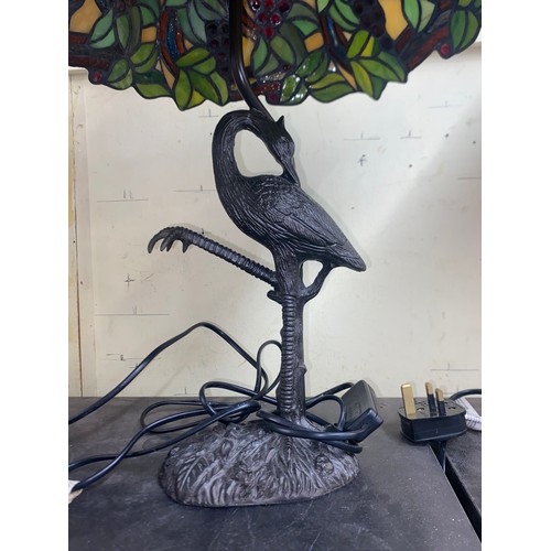 279 - METAL WORK CRANE FIGURAL TABLE LAMP WITH STAINED GLASS SHADE