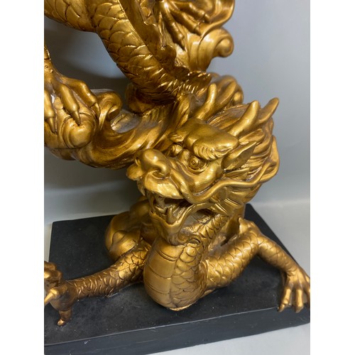 285 - PAIR OF DECORATIVE GILT EFFECT DRAGON CANDLE HOLDERS
