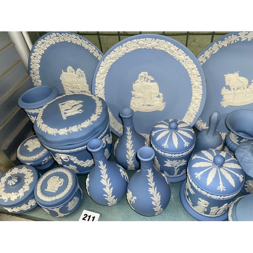211 - SHELF OF WEDGWOOD POWDER BLUE JASPERWARE COMMEMORATIVE PLATES, DECORATIVE BELLS, POWDER BOXES AND TR... 