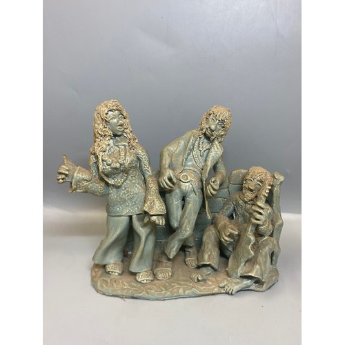 340A - TWO CONTEMPORARY POTTERY FIGURE GROUPS