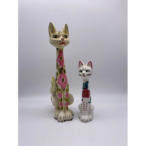 270 - TWO POTTERY DECORATED SEATED CAT FIGURES