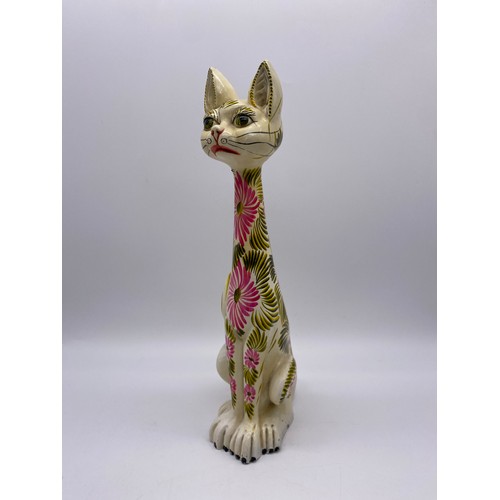 270 - TWO POTTERY DECORATED SEATED CAT FIGURES