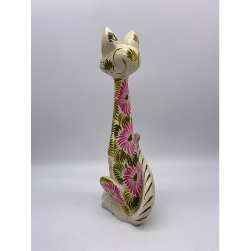270 - TWO POTTERY DECORATED SEATED CAT FIGURES