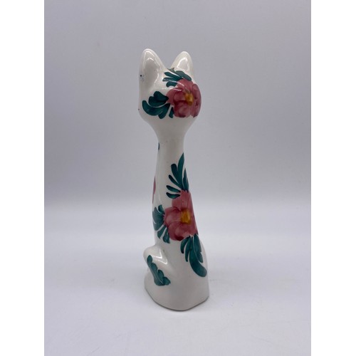 270 - TWO POTTERY DECORATED SEATED CAT FIGURES