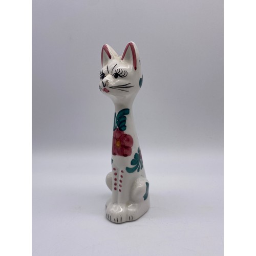 270 - TWO POTTERY DECORATED SEATED CAT FIGURES