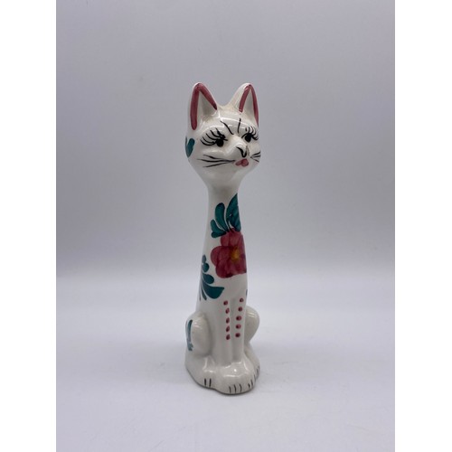 270 - TWO POTTERY DECORATED SEATED CAT FIGURES