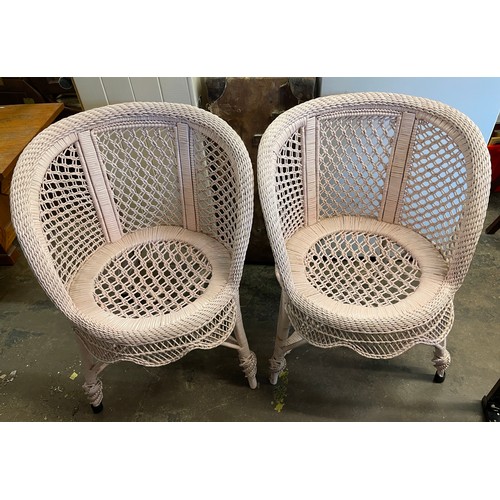 60 - PAIR OF PINK BAMBOO AND CANE WORK GARDEN CHAIRS