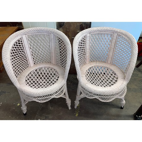 60 - PAIR OF PINK BAMBOO AND CANE WORK GARDEN CHAIRS