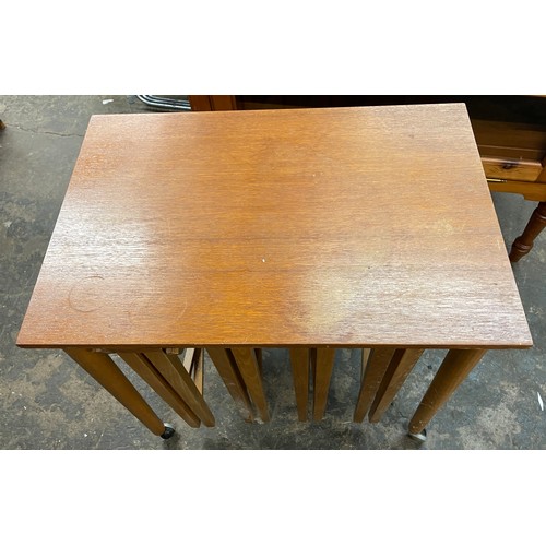 80 - NEST OF FOUR MINI DROP FLAP TEAK TABLES