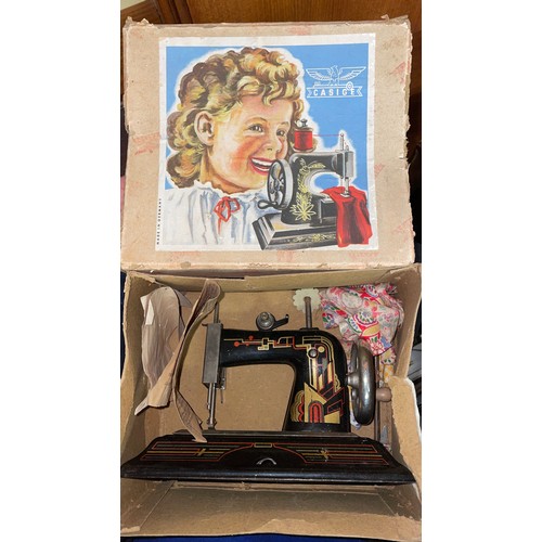 202 - BOXED VINTAGE CASIGE CHILDS SEWING MACHINE