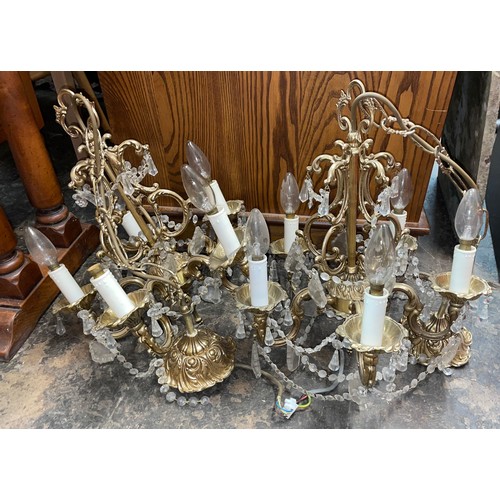 192 - PAIR OF BRASS FIVE CANDLE LIGHT CEILING LIGHTS WITH CUT GLASS DROPPERS