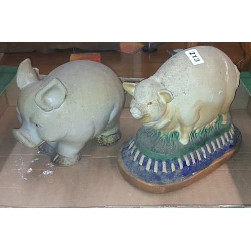 213 - TWO POTTERY MODELS OF PIGS