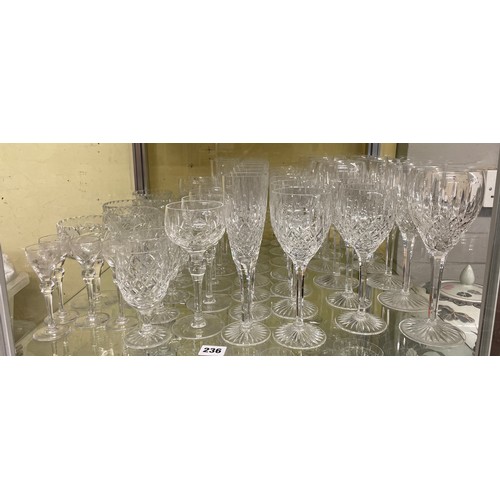 236 - SHELF OF SUITES OF CUT STUART CRYSTAL GLASSWARE