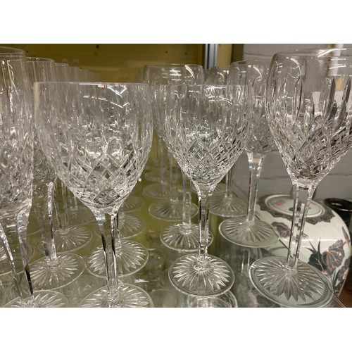 236 - SHELF OF SUITES OF CUT STUART CRYSTAL GLASSWARE