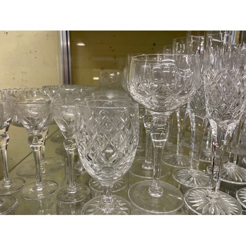 236 - SHELF OF SUITES OF CUT STUART CRYSTAL GLASSWARE