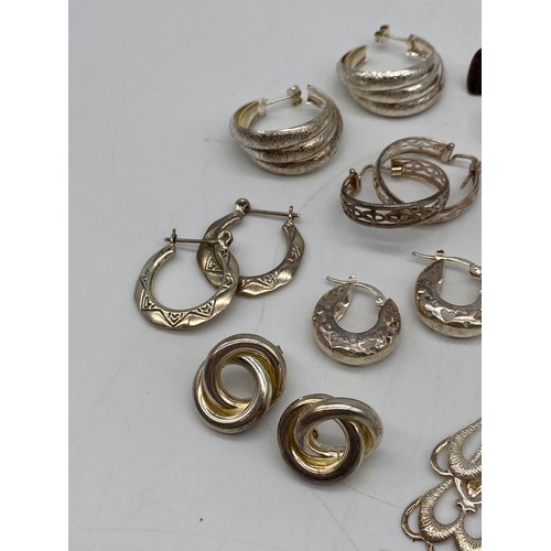 521 - SELECTION OF SILVER CREOLE HOOP SWIRL AND DROPPER EARINGS 2.5OZ APPROX