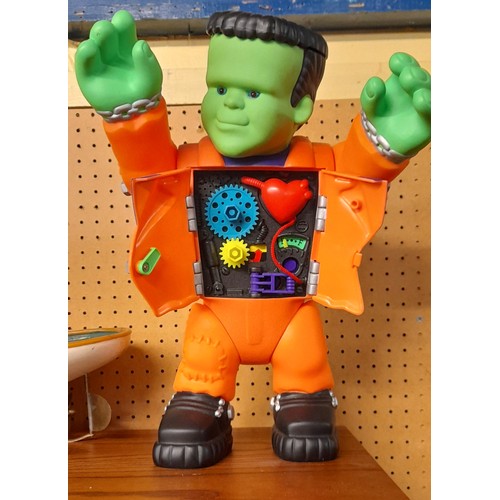 254 - BATTERY OPERATED FRANKENSTEIN TOY ROBOT